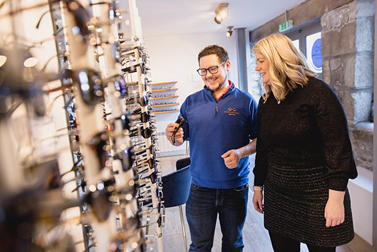 Customer-Choosing-Sunglasses-2-Charlestown-Eyecare